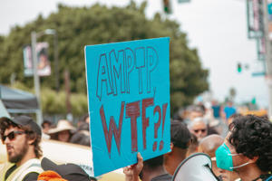 “AMPTP, WTF_!”-Sign-at-SAG-AFTRA’s-L.A.-Solidarity-March-_-Rally-outside-Paramount-Studios-on-9-13.jpg